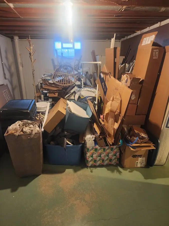 Roll-off dumpster container at job site for Yard Waste Dumpster Rental in Pineville